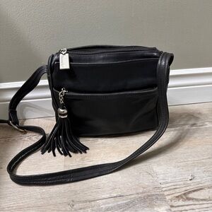 Tignanello Black Leather Crossbody Bag with Tassel – Multiple Zip Pockets